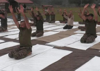 Indian army soldiers practicing Yoga