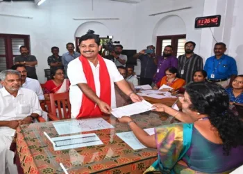 LDF candidate M Swaraj filing his nomination before Tahsildar M P Sindhu in Nilambur
