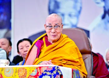 Holiness the Dalai Lama having the first taste of his birthday cake during celebrations in honour of his 90th birthday at the Main Tibetan Temple courtyard in Dharamshala, HP, India on July 6, 2025.