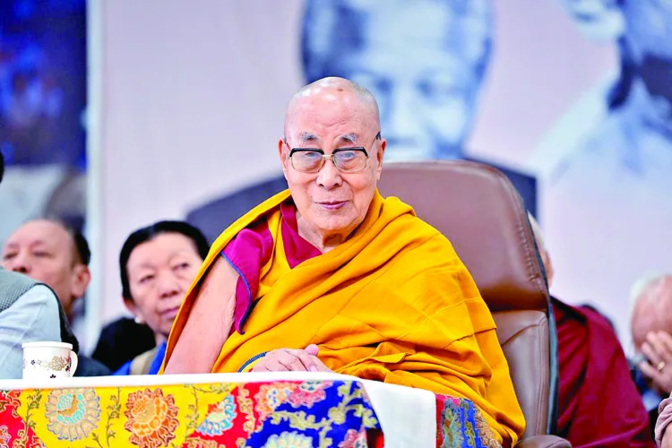 Holiness the Dalai Lama having the first taste of his birthday cake during celebrations in honour of his 90th birthday at the Main Tibetan Temple courtyard in Dharamshala, HP, India on July 6, 2025.