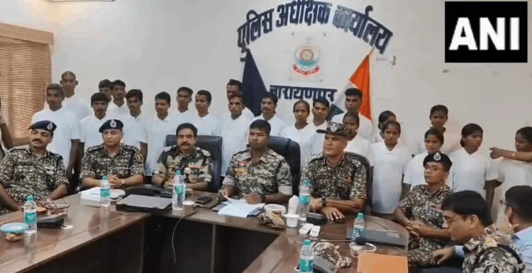 Surrendered Maoists with officials in Narayanpur (ANI photo)
