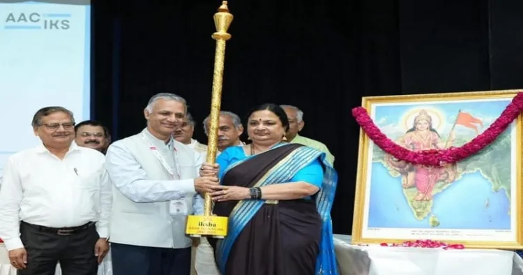 JNU VC Prof. Santishree Dhulipudi Pandit passes the 'Jnan Dhand' to Prof. Sachin Chaturvedi, VC of Nalanda University, where the next IKS Conference will be held