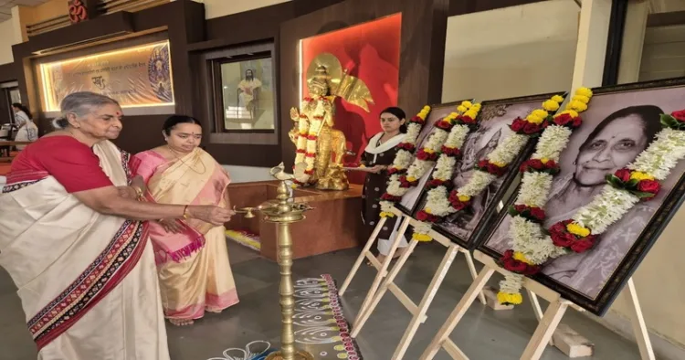 Pramukh Sanchalika Shanta Kumari lighting the traditional lamp at the bi-annual meeting of the Rashtra Sevika Samiti