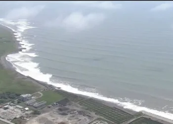 Tsunami waves approach the coast following a massive 8.8-magnitude earthquake off Russia’s Kamchatka Peninsula