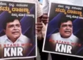 Supporters of KN Ranjanna holding the posters