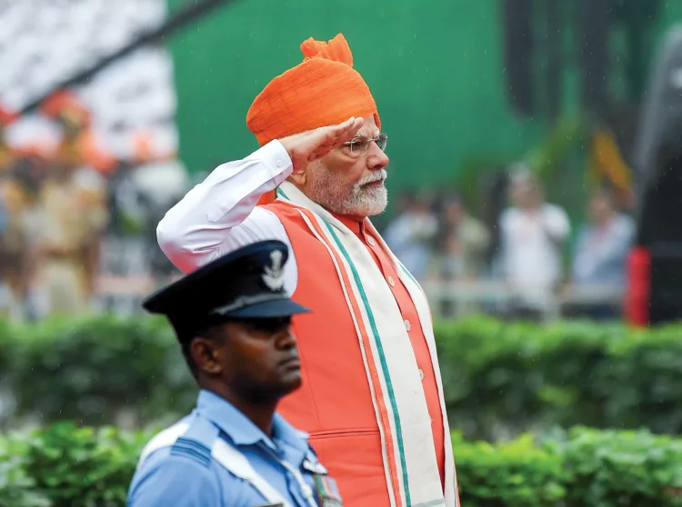 New Delhi, Aug 15 (ANI): Prime Minister Narendra Modi receives a Guard of Honour prior to hoisting the National Flag at Red Fort on 79th Independence Day, in New Delhi on Friday. (ANI Photo/Rahul Singh)