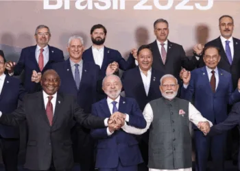 In this image via PMO on July 7, 2025, Prime Minister Narendra Modi, Brazil's President Luiz Inacio Lula da Silva and South Africa's President Cyril Ramaphosa during a group photograph with BRICS members, partners and outreach invitees at the BRICS Summit 2025, in Rio de Janeiro, Brazil.