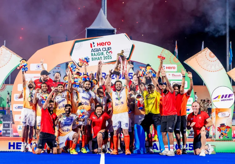 Rajgir [Bihar], Sep 07 (ANI): India players poses for a picture with the trophy after defeating Korea in the final match of Hockey Asia Cup 2025, in Rajgir on Sunday. (@narendramodi X/ANI Photo)