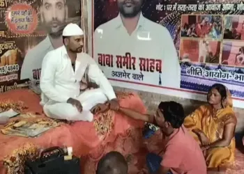 This is Sameer Baba. He claims to cure illnesses with water and amulets