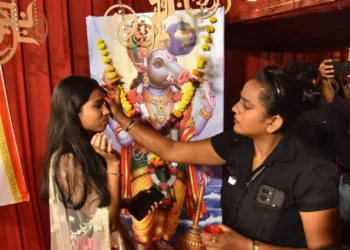 Varah Dev's poster outside a Garba Pandal in Maharashtra