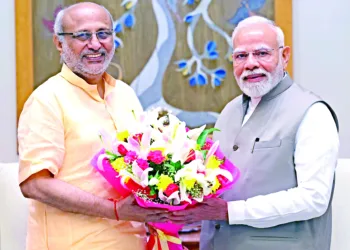 PM Narendra Modi felicitating CP Radhakrishnan on being nominated as NDA’s Vice Presidential nominee