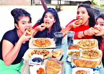 Partying with friends, colleagues and having western fast food has become more of a status statement today