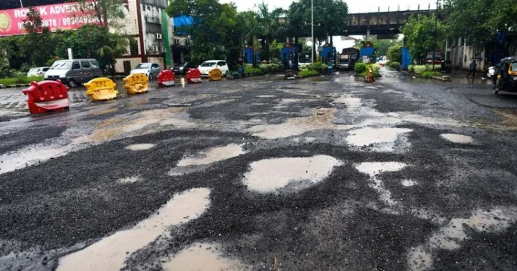 Potholes in the road