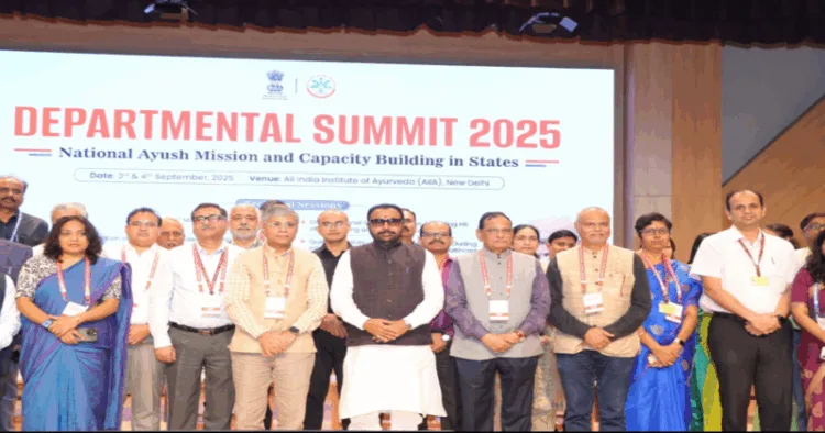 Union Minister of State (Independent Charge) of Ministry of Ayush, Prataprao Jadhav along with other dignitaries on the stage at the Departmental Summit on 'National Ayush Mission and Capacity Building in States' at AIIA