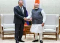 Prime Minister Narendra Modi and with Russia's Foreign Minister Sergei Lavrov