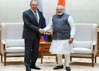 Prime Minister Narendra Modi and with Russia's Foreign Minister Sergei Lavrov