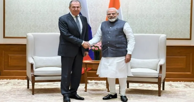 Prime Minister Narendra Modi and with Russia's Foreign Minister Sergei Lavrov