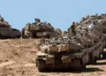 A convoy of Israeli tanks is deployed at Israel's border with the Gaza Strip on September 16, 2025