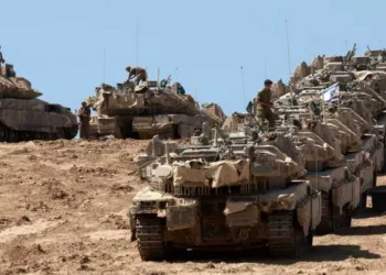 A convoy of Israeli tanks is deployed at Israel's border with the Gaza Strip on September 16, 2025