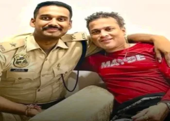 Deputy Superintendent of Police (DSP) Sandeepan Garg, with cousin brother and singer Zubeen Garg