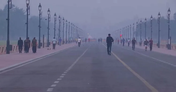 An early morning view of the Kartavya Path covered in a thick layer of smog as the Air Quality Index (AQI) deteriorates, in New Delhi