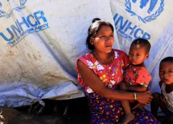 A displaced Myanmar woman living in a camp
