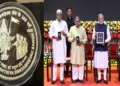 (Left) Special coin commemorating the centenary of RSS (Right- L To R) Union Minister of Culture Gajendra Singh Shekhawat, RSS Sarkaryavah Dattatreya Hosable, PM Narendra Modi, Delhi CM Rekha Gupta