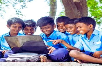 School children working on the laptop