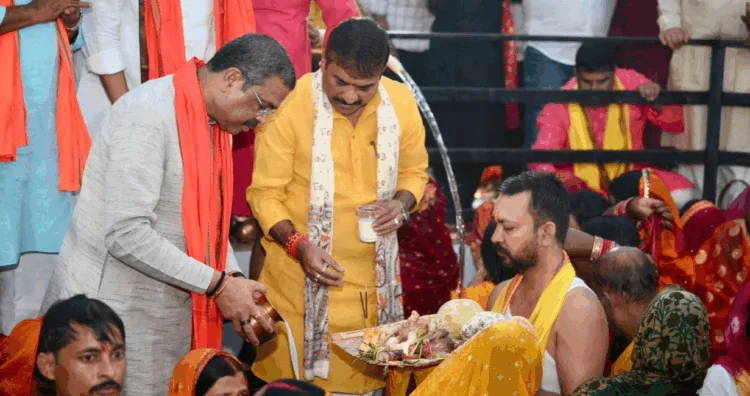 Union Minister Dharmendra Pradhan performing rituals during Chhath Mahaparva, Image X