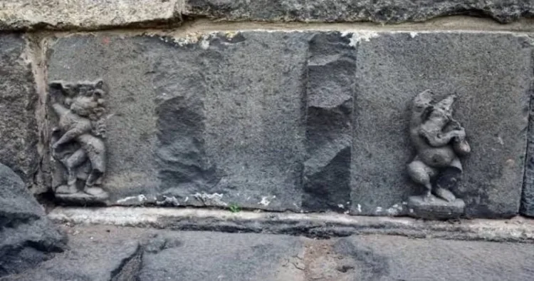 Motifs of Bhagwan Ganesha and a dancing female figure at Adina mosque, Malda