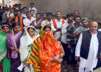 Patna, Nov 06 (ANI): Voters wait in queues to cast their vote for the first phase of the Bihar assembly election, in Patna on Thursday. (ANI Photo)