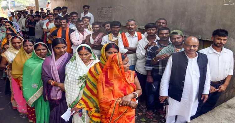 Patna, Nov 06 (ANI): Voters wait in queues to cast their vote for the first phase of the Bihar assembly election, in Patna on Thursday. (ANI Photo)