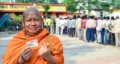 Gaya, Nov 11 (ANI): A monk shows his ink-marked finger after casting his vote for the second phase of the Bihar assembly election, in Gaya on Tuesday. (@CEOBihar X/ANI Photo)