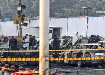 New Delhi, Nov 11 (ANI): National Security Guard (NSG) personnel investigate the site of the blast in a Hyundai i20 car near Gate no 1 of the Red Fort Metro station, in Delhi on Tuesday. (ANI Photo)