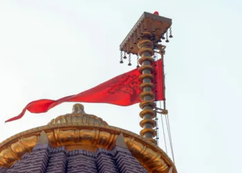 Ayodhya, Nov 25 (ANI): A view of the Saffron flag on the top of Shri Ram Janmabhoomi Mandir during the Dhwajarohan Utsav, in Ayodhya on Tuesday. (DPR PMO/ANI Photo)