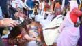 BJP MLA Bhavna Bohra and others washing feet of the returnees, image courtesy ANI