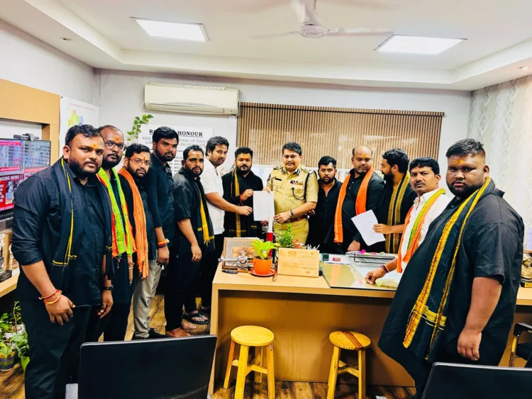 BJYM Telangana presenting letter to Telangana Police officer