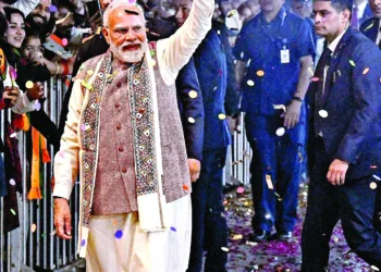 New Delhi, Nov 14 : Prime Minister Narendra Modi greets the supporters as the National Democratic Alliance (NDA) wins the Bihar Assembly elections, at BJP headquarters, in New Delhi on Friday
