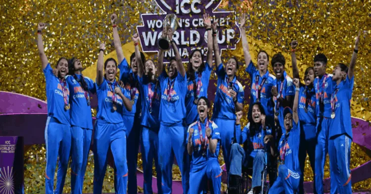 Women in blue lift the ICC Women Cricket World Cup 2025 trophy