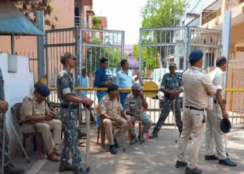 Police outside the house where 2500 kg of explosive was recovered