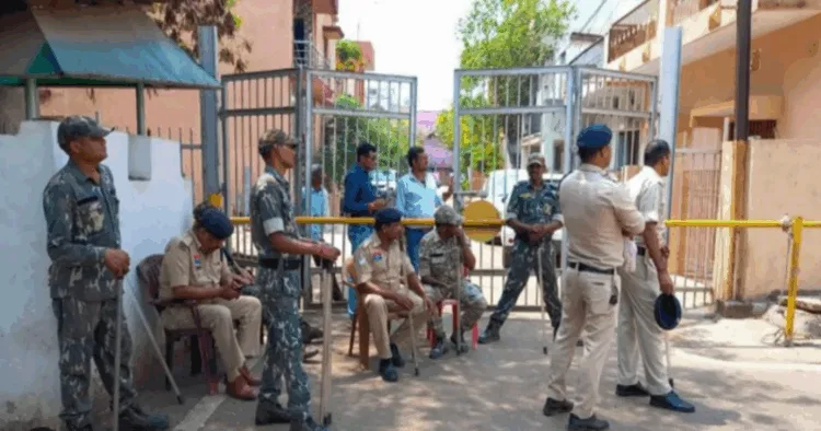 Police outside the house where 2500 kg of explosive was recovered