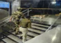 Security personnel with sniffer dogs at the Red Fort metro station