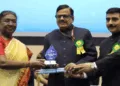 Anurag Srivastava, Additional Chief Secretary, Namami Gange and Rural Water Supply Department, and Dr Balakar Singh, Housing Commissioner, receive the award from President Droupadi Murmu in New Delhi