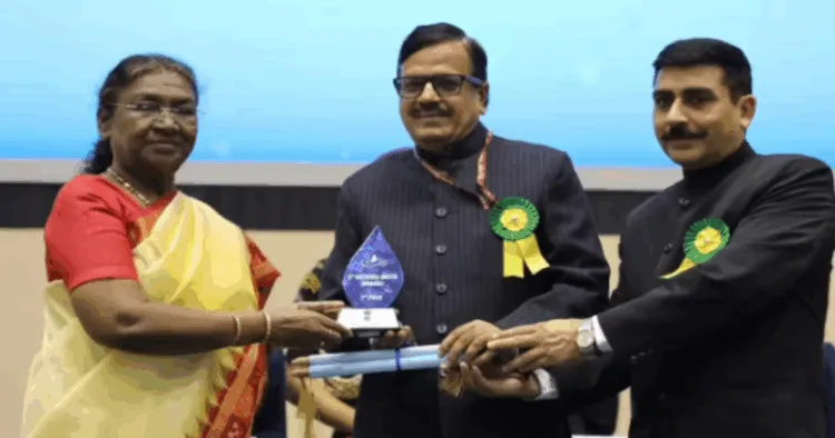Anurag Srivastava, Additional Chief Secretary, Namami Gange and Rural Water Supply Department, and Dr Balakar Singh, Housing Commissioner, receive the award from President Droupadi Murmu in New Delhi