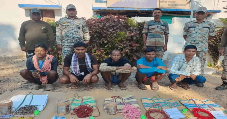 Arrested Maoists with seized arms