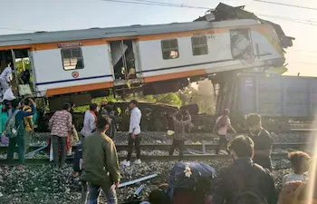 eople gather after a passenger train collided with a goods train near Bilaspur railway station in Chhattisgarh