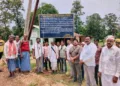 Villagers of Bansla and Junwani in Kanker district stand united beneath a warning board prohibiting entry of Pastors