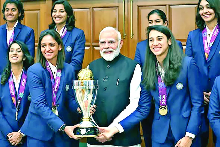 Hosting Women Icons: PM Narendra Modi holding the ICC Women’s Cricket World Cup trophy during his meeting with the women cricket team