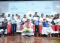 CM Mohan Majhi with receipents of citizenship certificates under the CAA 2019 during a programme held in Bhubaneswar