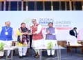 Union Minister for New & Renewable Energy Pralhad Joshi, Odisha Chief Minister Mohan Charan Majhi, and other dignitaries at the Global Energy Leaders’ Summit 2025 in Puri.
